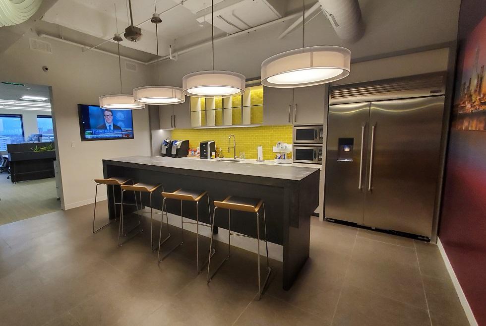 The pantry and breakroom facilitate breaks, meals, and informal meetings 
